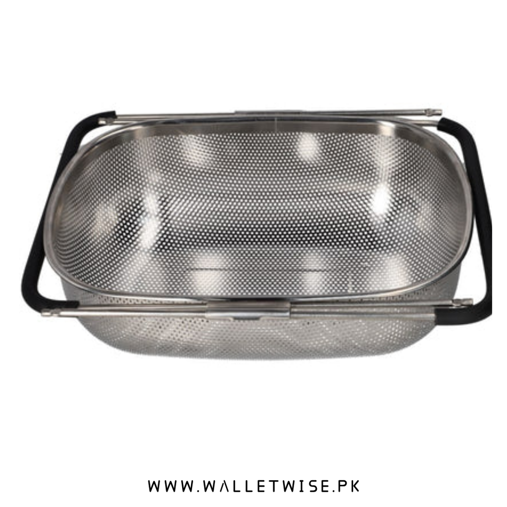 Metallic colander with black handles on a white background, branded 'www.walletwise.pk'.